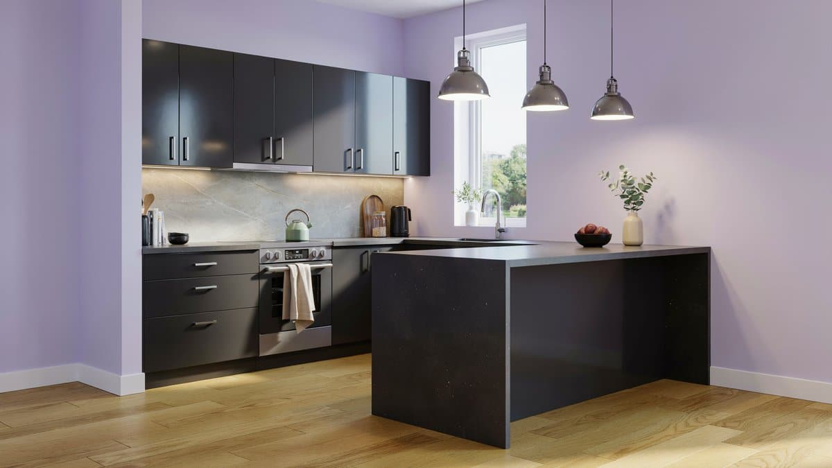 Lavender walls with black high gloss cabinets and a dark angled island