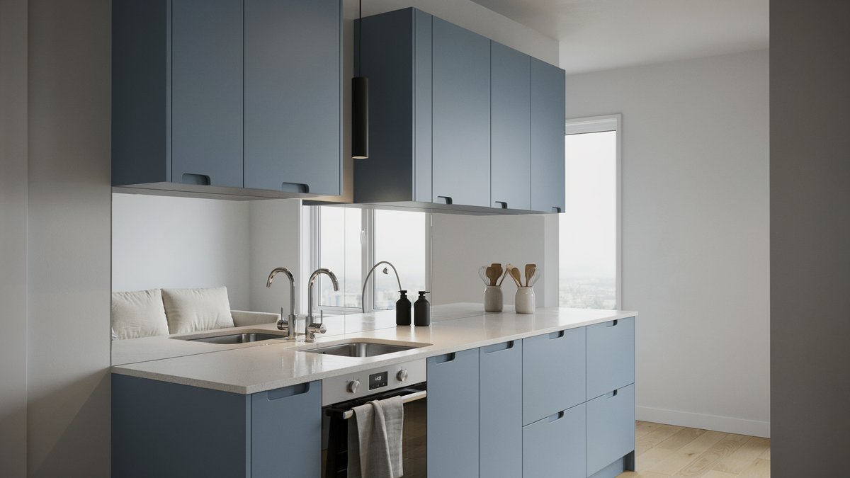 Matte slate blue cabinets with a white counter and mirrored backsplash