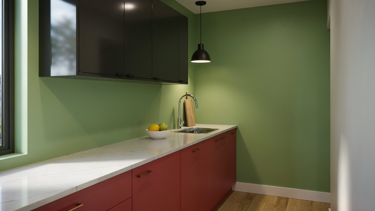 Lime green wall above red base cabinets and a white quartz counter