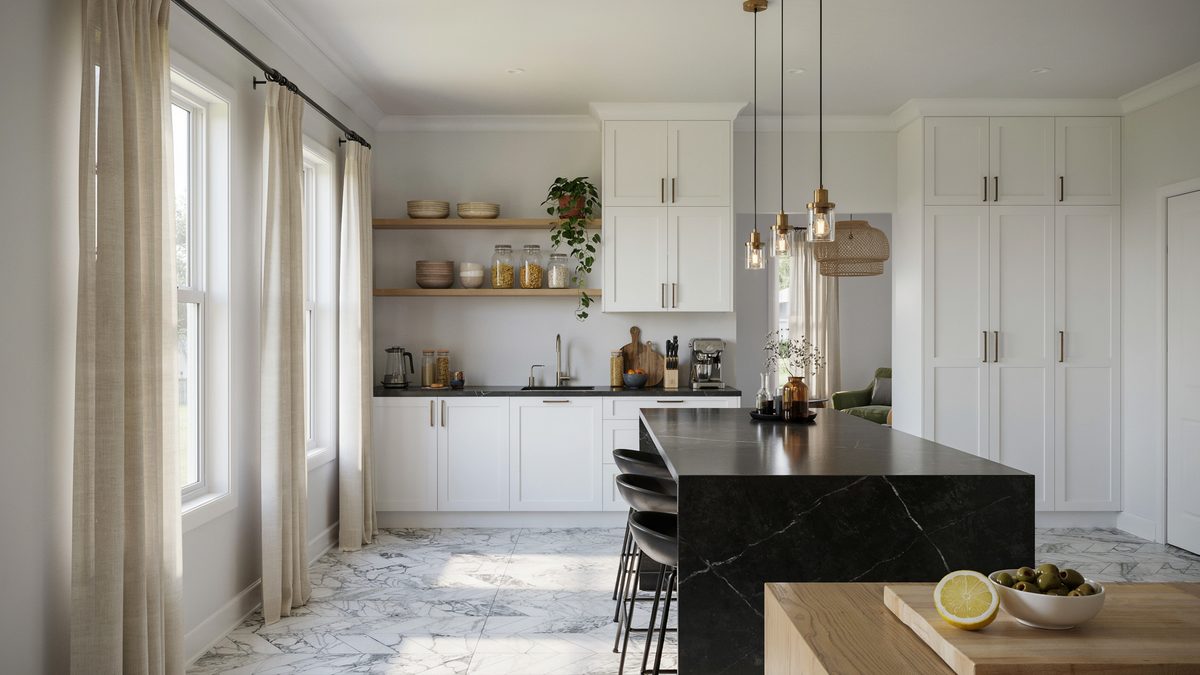 Black stone breakfast island contrasts white cabinets over pale marble floors
