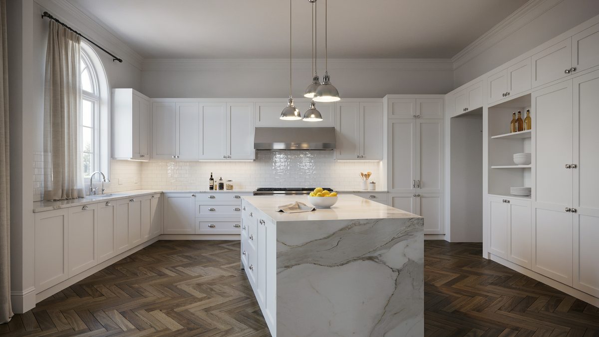 White shaker kitchen with marble waterfall island and herringbone wood floor