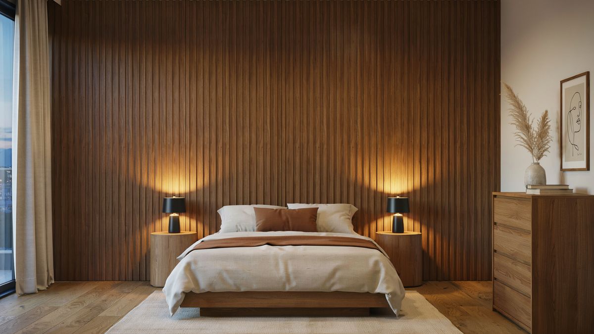 Bedroom with brown wood slat accent wall and warm lamp lighting