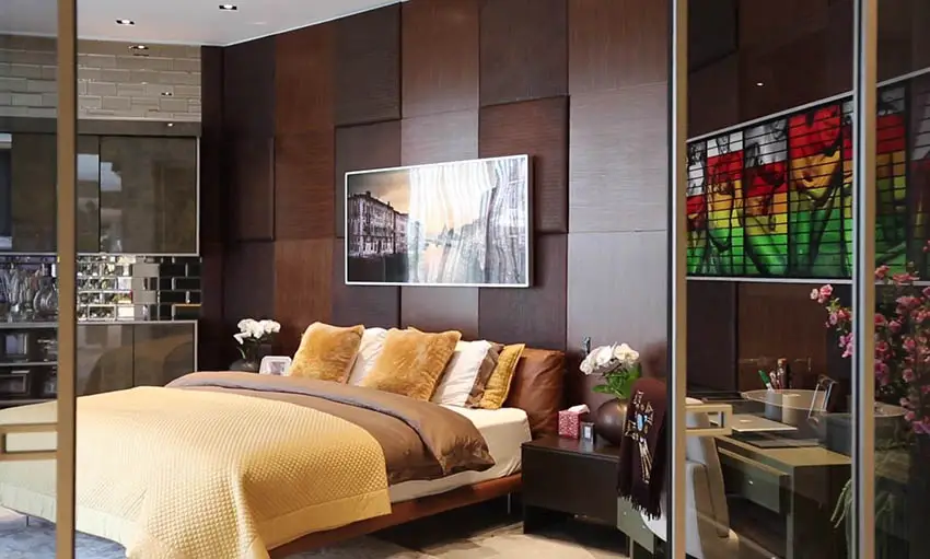 Masculine master bedroom with brown accent wall