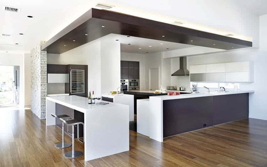 Open modern kitchen with support beam island