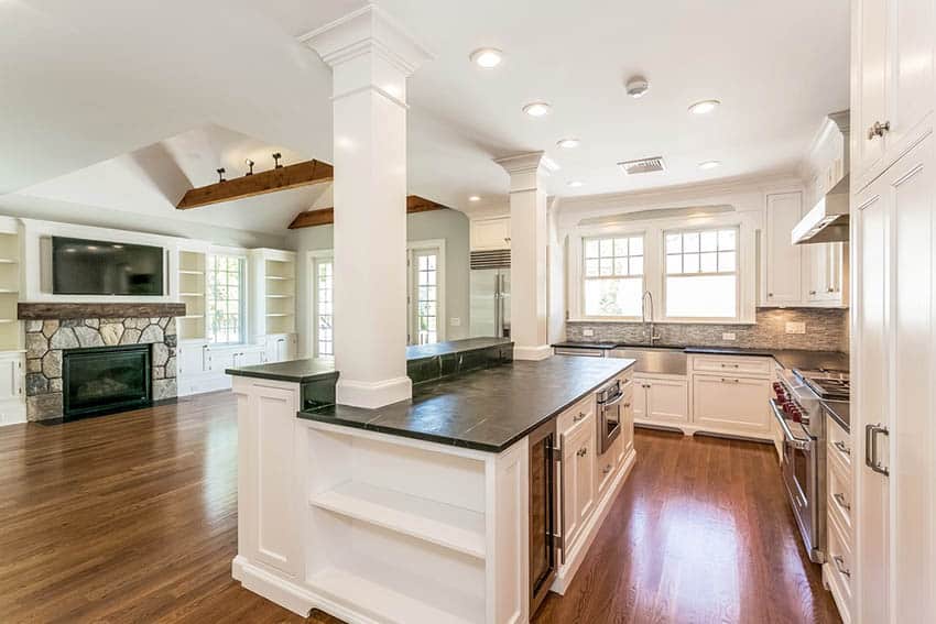 Traditional kitchen island with support columns to ceiling