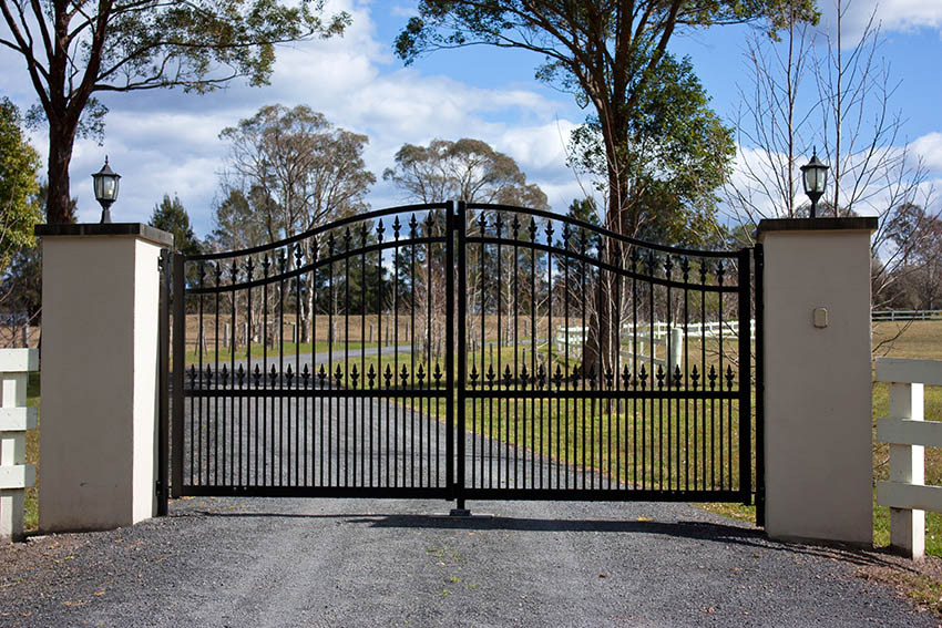 Black wrought iron driveway gate