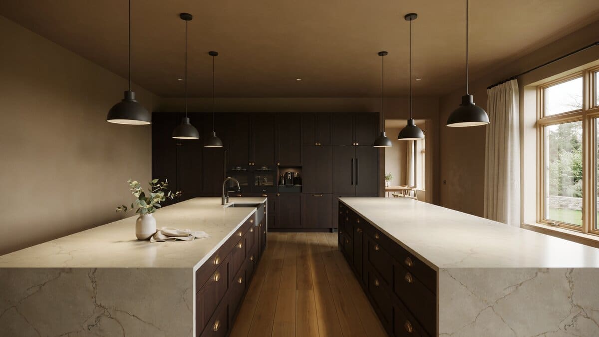 Wide view of mocha walls, dark cabinets and two parallel islands with pendant lights