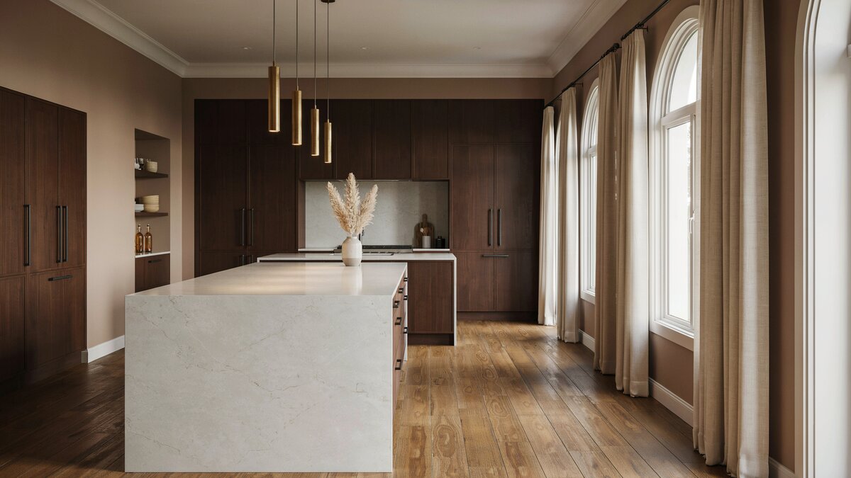 Mocha painted walls above dark cabinets and two long islands in a large kitchen