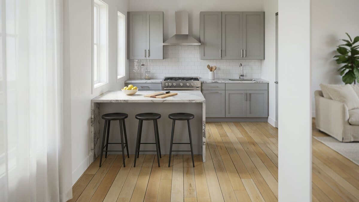 Gray marble breakfast bar and white subway backsplash in an open concept white kitchen