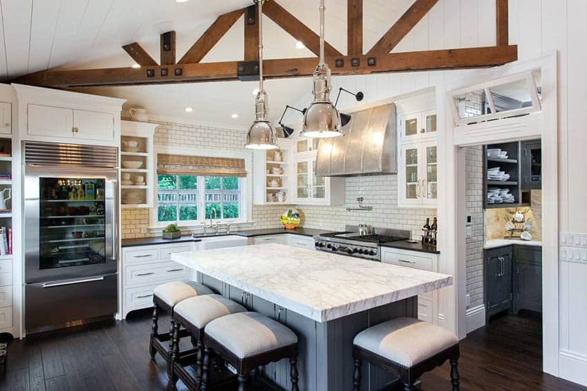 Rustic contemporary kitchen with gray island marble countertop exposed beam and butlers pantry