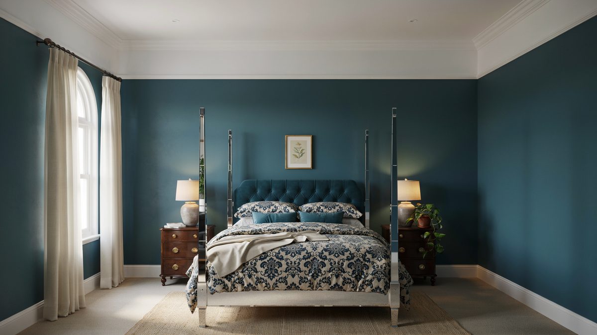 Teal walls with a metal four poster bed and blue damask bedding