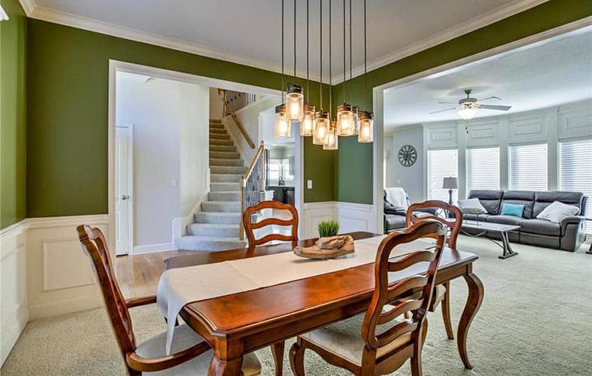 dining-room-with-bright-green-paint-and-white-wainscoting