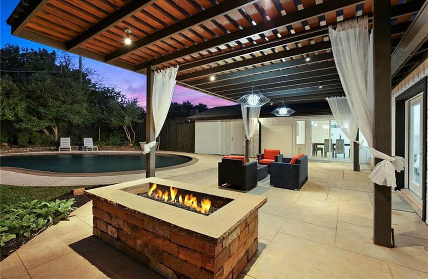 Modern backyard patio pergola with fire pit