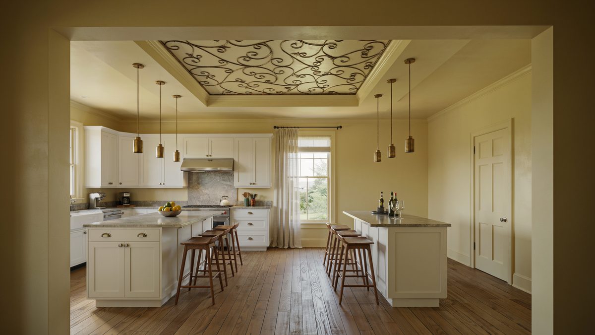 Painted scrollwork ceiling above two white islands ringed with wood stools