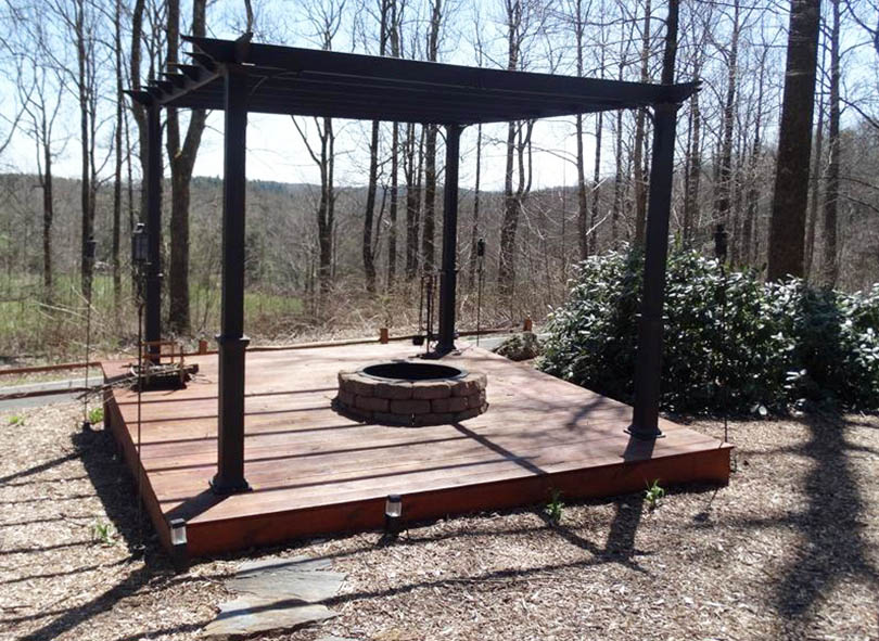 Wood deck with pergola and firepit