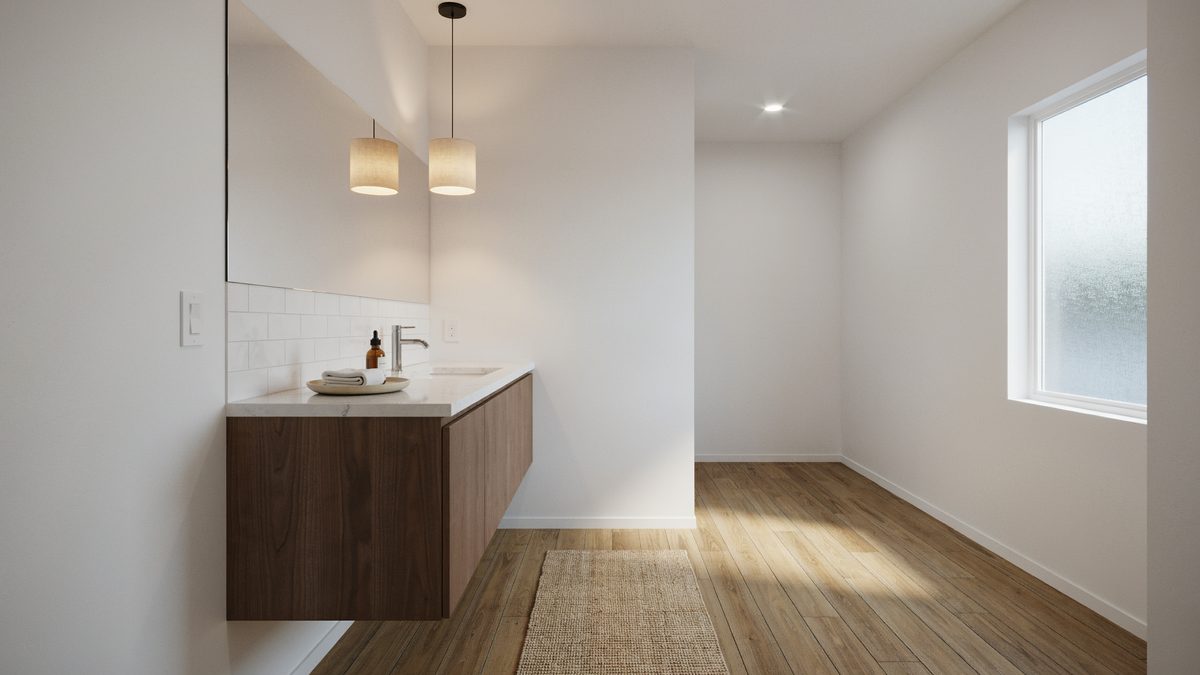 Wood style laminate floor with two pendant lights over a walnut floating vanity