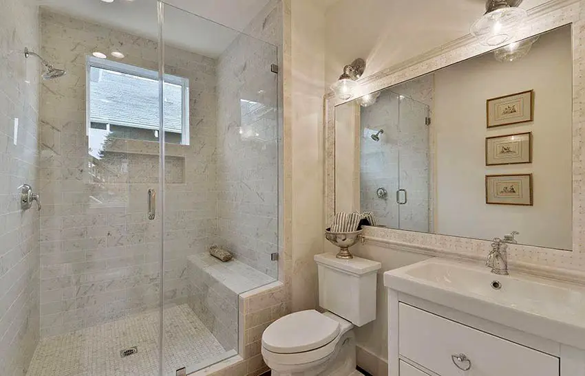 bathroom-with-single-handle-faucet-marble-shower-with-bench