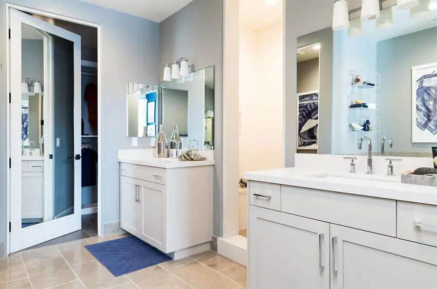 contemporary-master-bathroom-with-quartz-dual-vanity-two-sinks-travertine-flooring