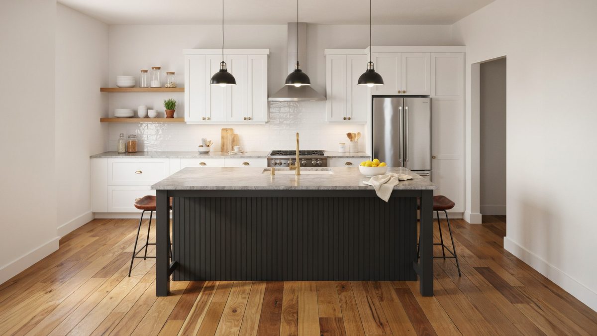 Charcoal beadboard island with pale granite top and slim black pendant lights