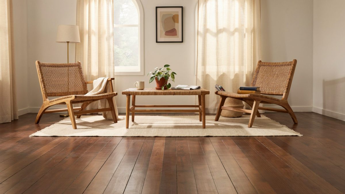 Sitting area with rattan chairs resting on rich American walnut planks