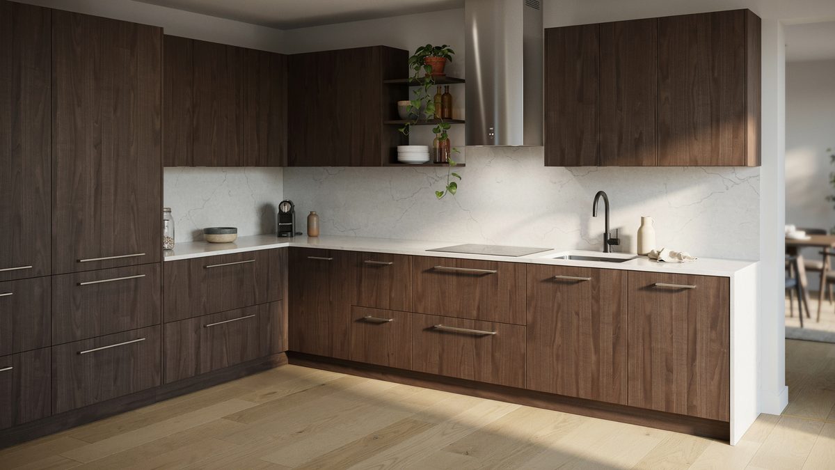 Dark walnut cabinets with bar pulls under a white quartz counter