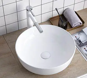 Bathroom above counter sink with round design
