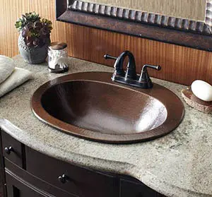 Bathroom copper sink with oval design