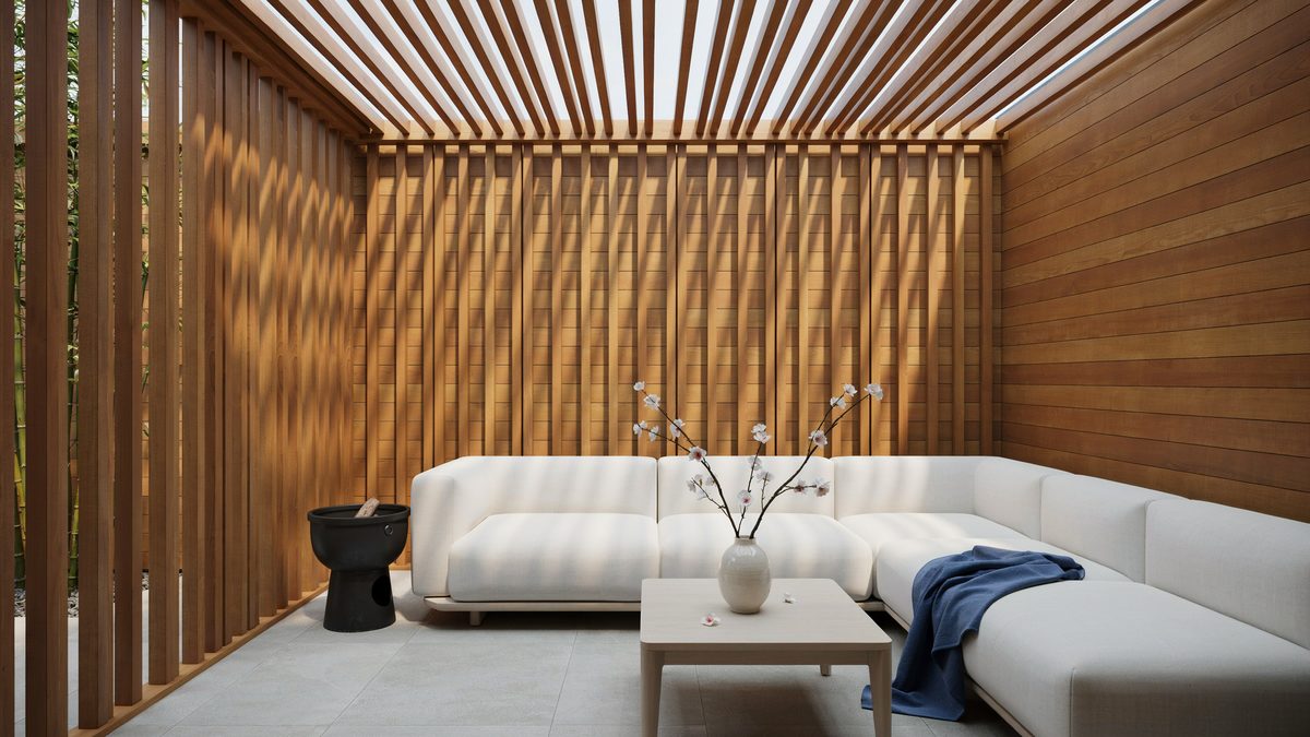 Japanese style patio enclosed by pinewood slats with modular white seating