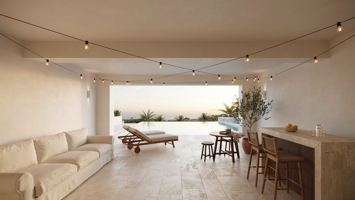 Covered poolside patio with upholstered seating, bar counter and hanging lights