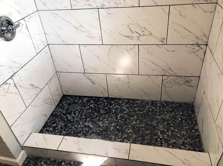 Bathroom shower with pebble tile