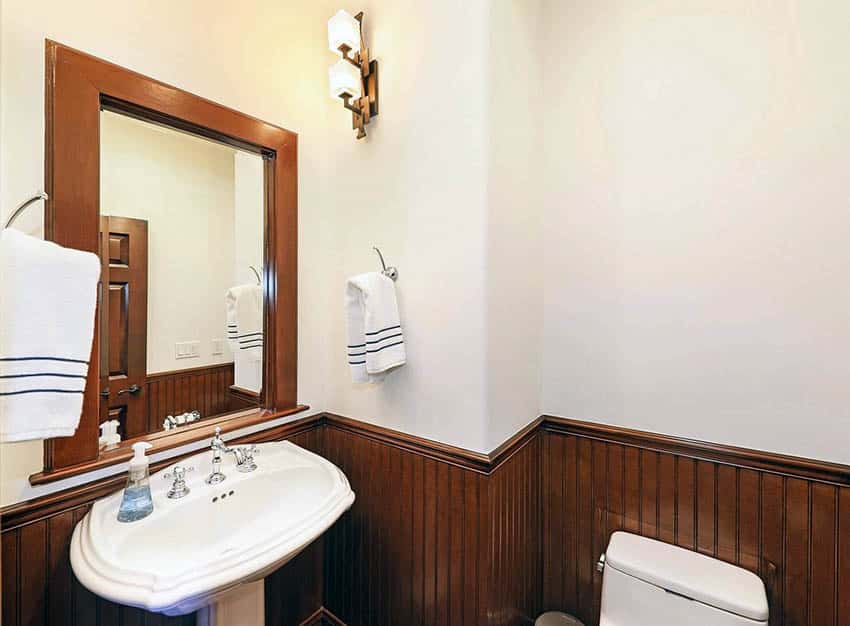 Bathroom with stained wood wainscoting