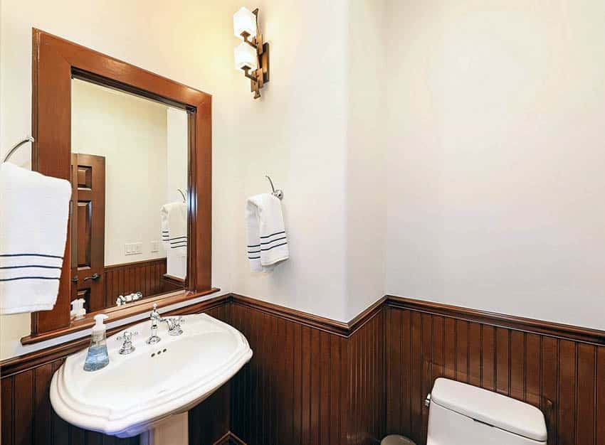 Bathroom with stained wood for the wainscoting