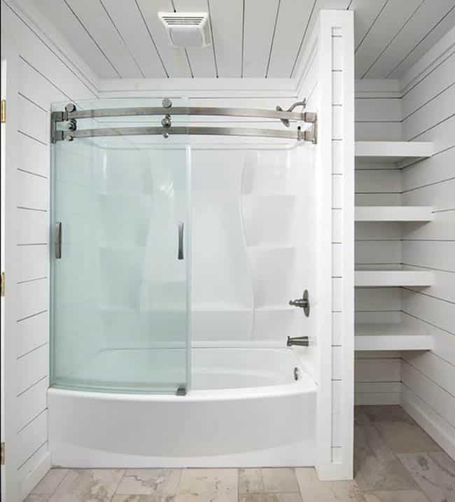 Bathroom with plank ceiling and laminate floors