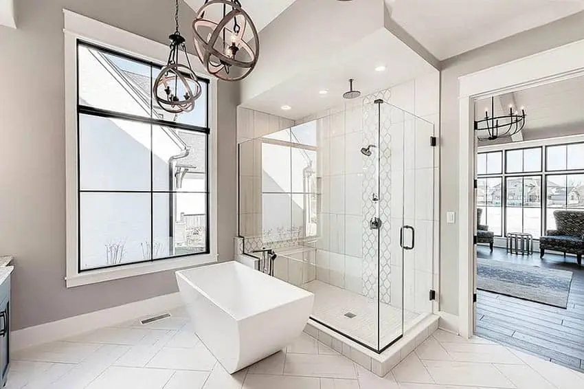 Contemporary master bathroom with ceramic flooring, rainfall shower and globe lighting