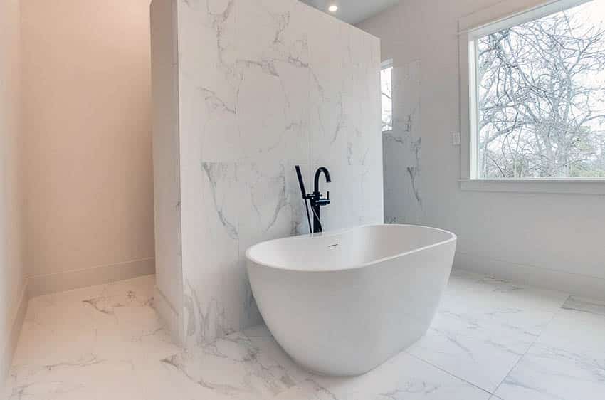 Master bathroom with marble look porcelain tile