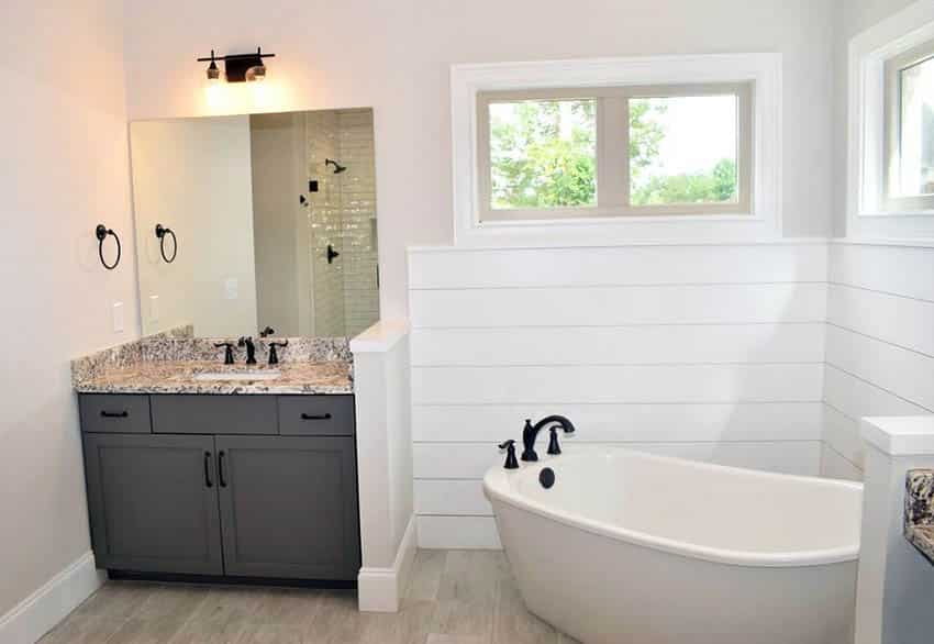 Bathroom with shiplap wainscoting