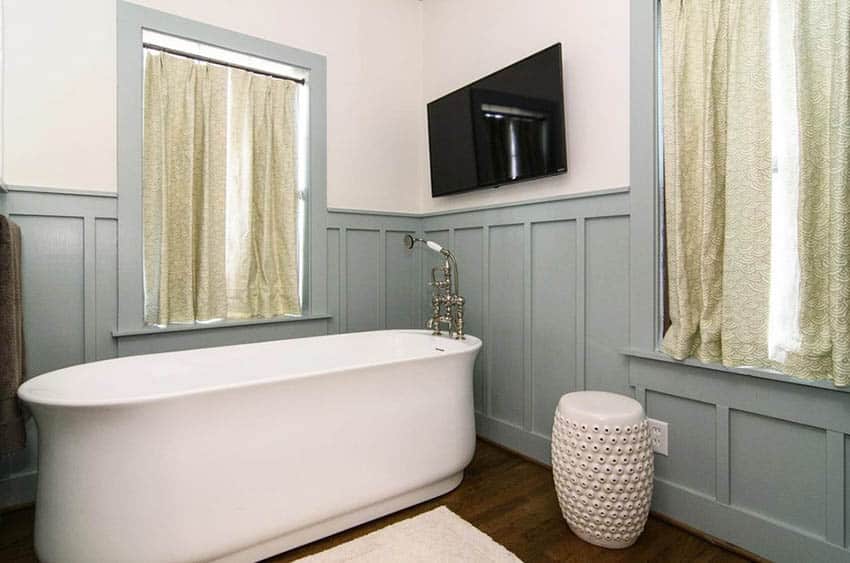 Traditional bathroom with painted wood wainscoting