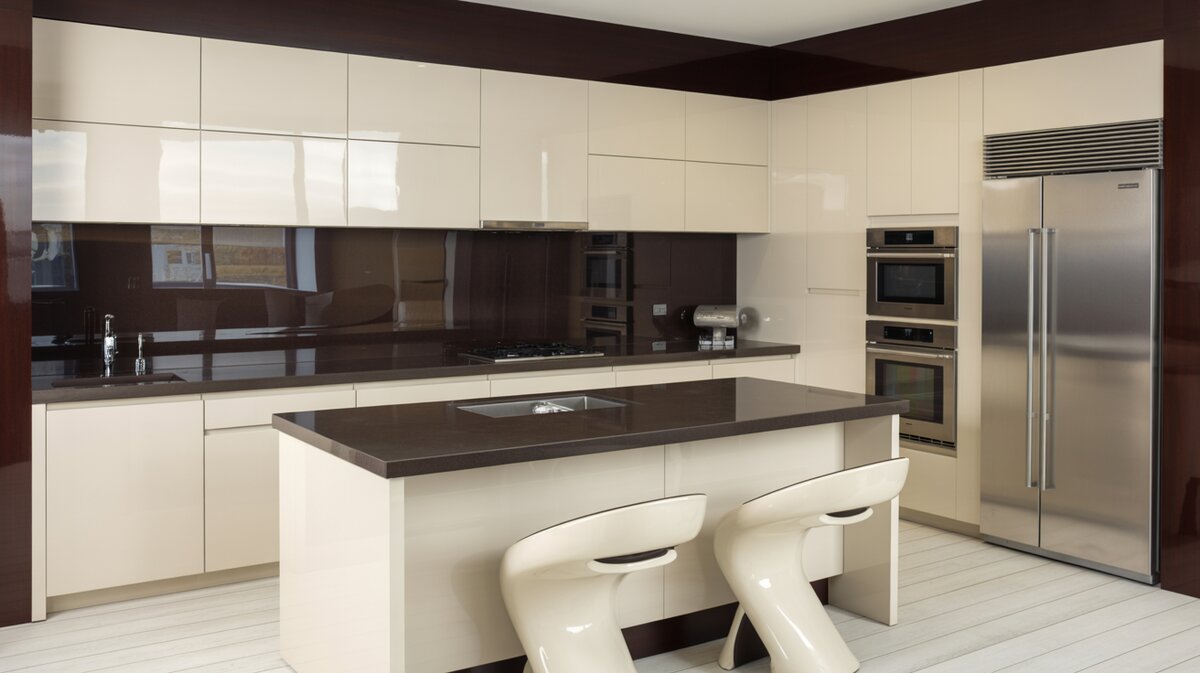 Ultra modern interior design kitchen with glossy white lacquer cabinets and dark island