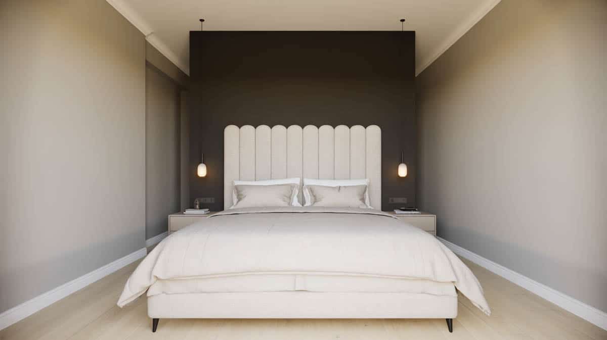 White bedroom with tall upholstered headboard against a matte black accent wall