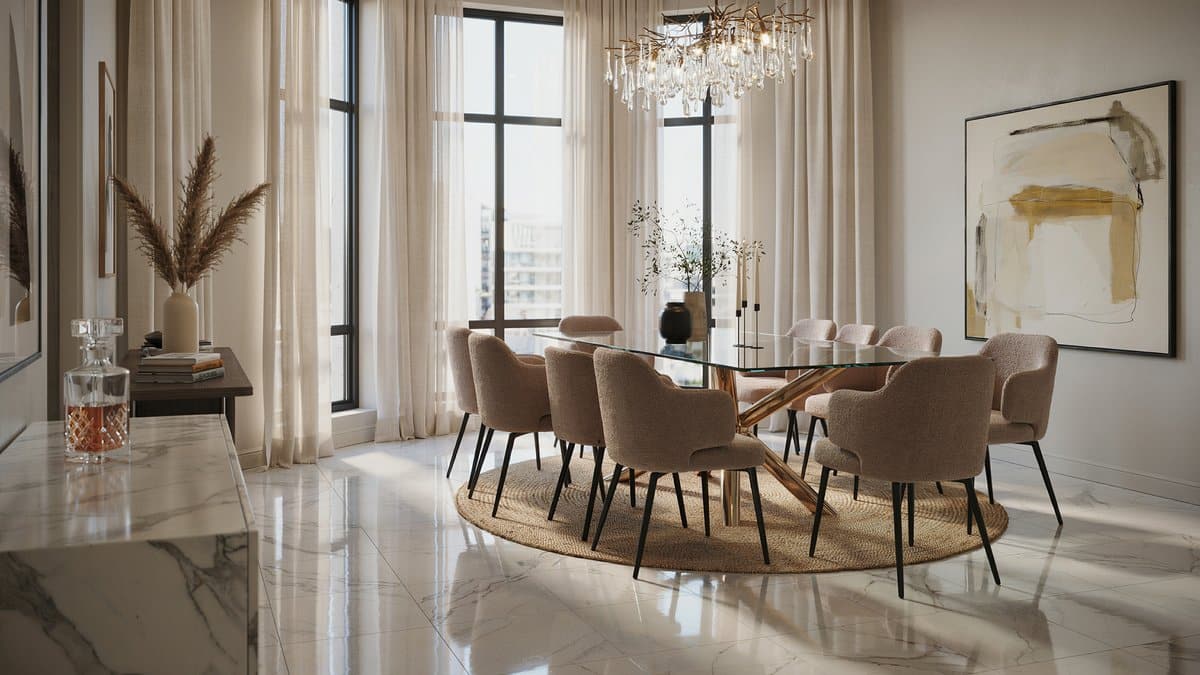 Elegant dining room with polished white marble tile flooring and glass table