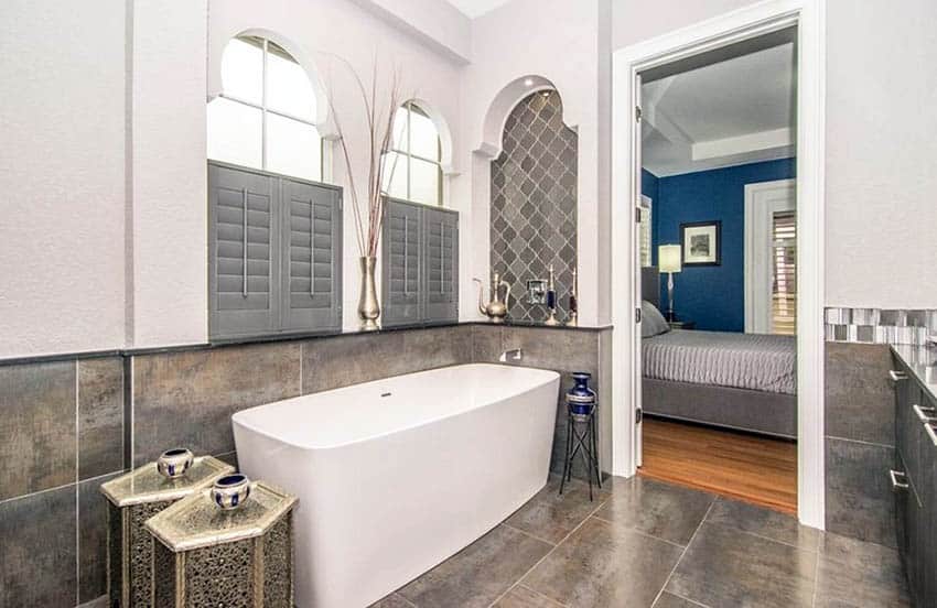Bathroom with arabesque tile wall alcove