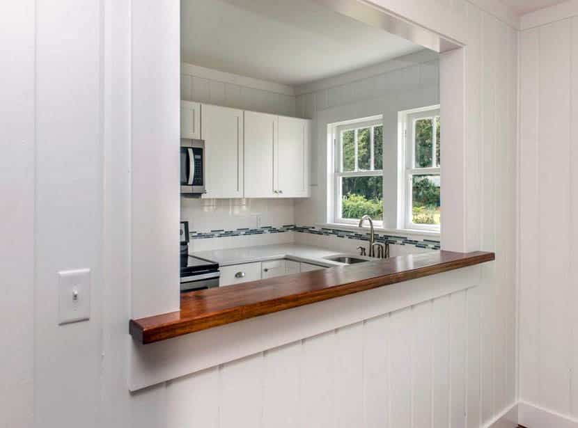 Closed layout kitchen with pass through window