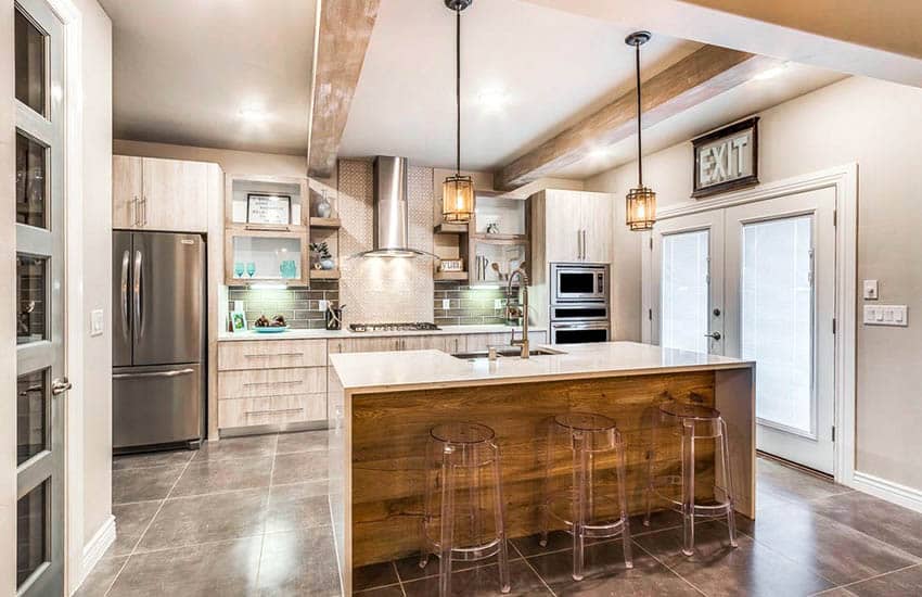 Kitchen with faux wood beam ceiling, waterfall countertop island with reclaimed wood base 