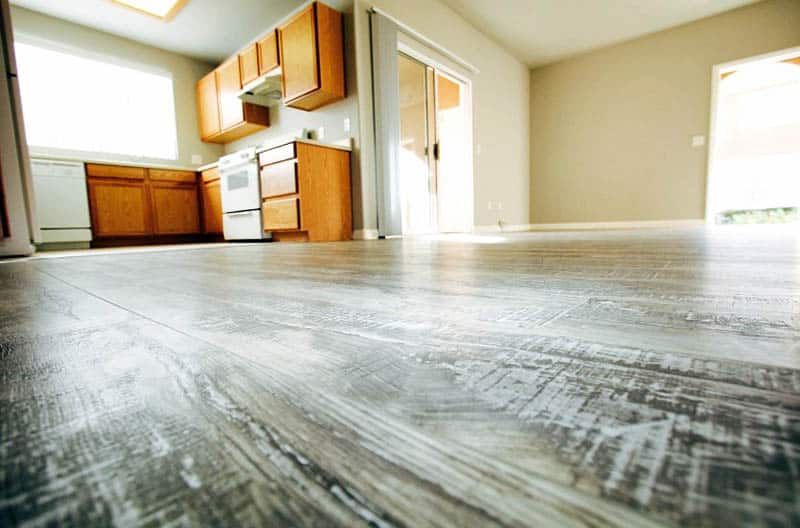 Kitchen with wood style linoleum floors