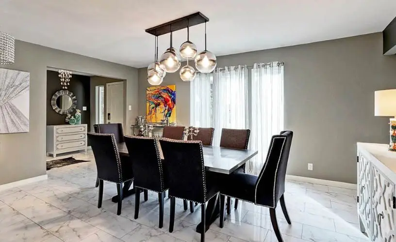 Dining room with marble tile flooring
