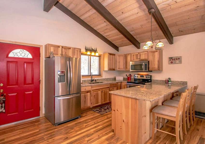 Kitchen with hickory cabinets and hickory flooring