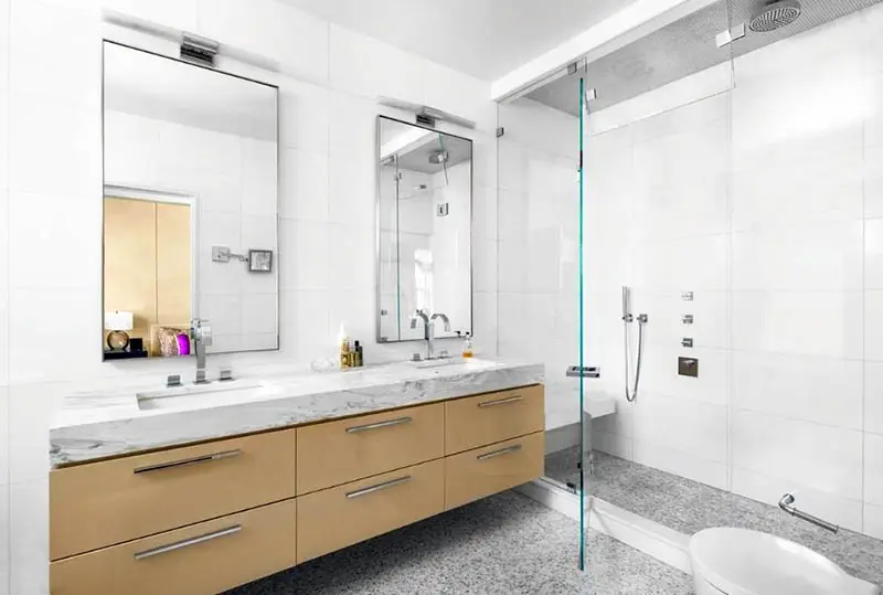 Bathroom with shower mirror bench and floating vanity