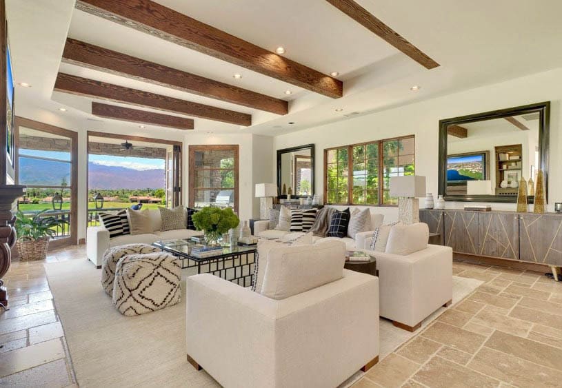 Open living room with wood beams