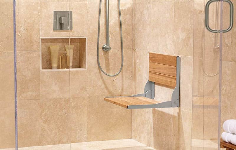 Wall mounted bathroom with foldable seat