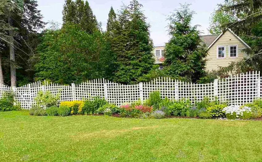 Custom fence in green lawn